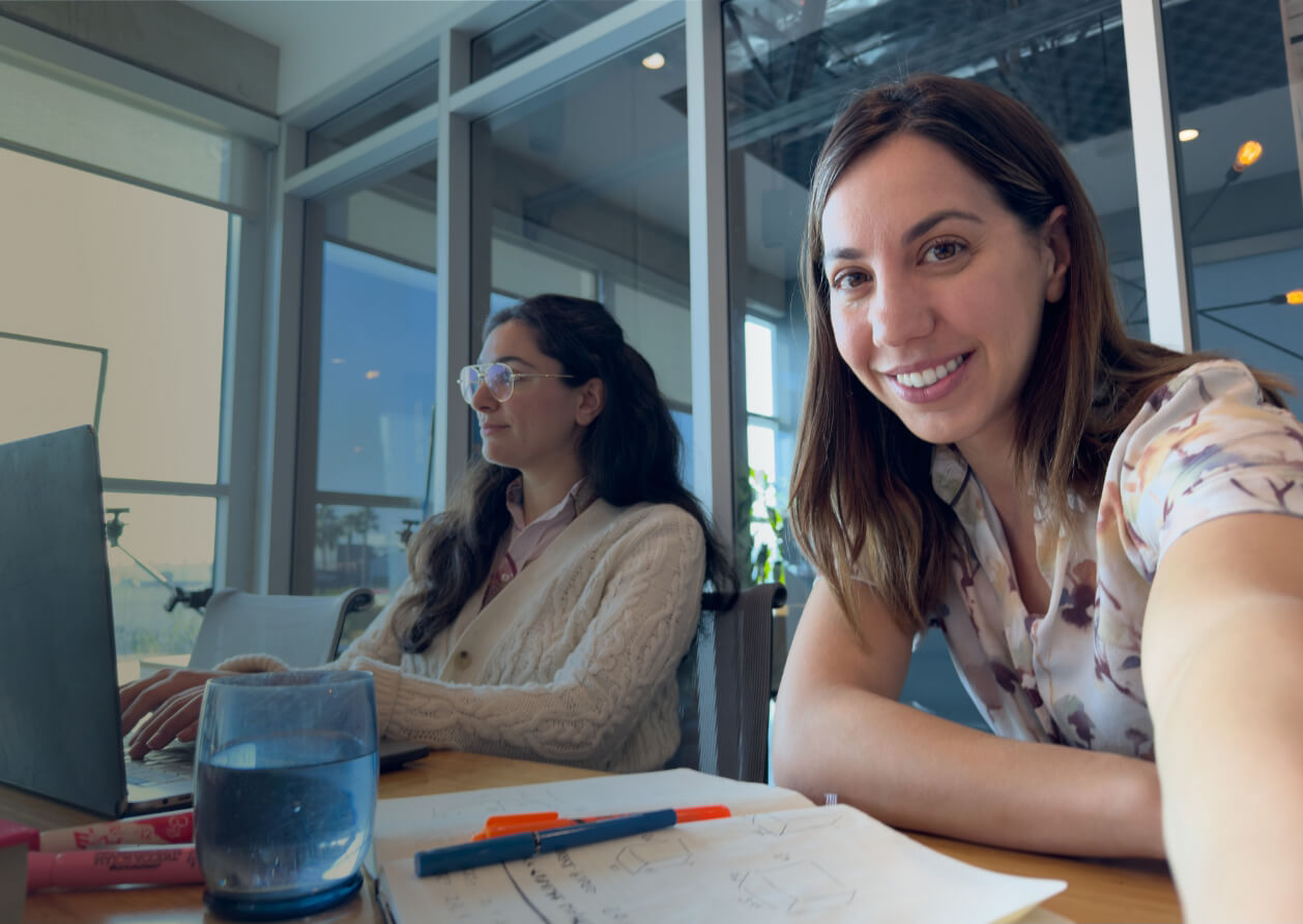 Actor portrayal of a woman smiling in an office saying I didn't have to let cost get in the way of relief of endo pain