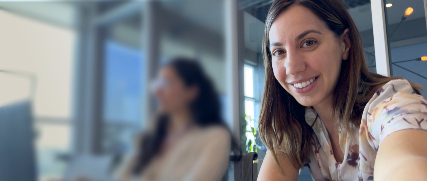 Woman who is taking MYFEMBREE® (relugolix, estradiol, and norethindrone acetate) for her endometriosis pain takes a selfie with a friend. Not an actual patient.