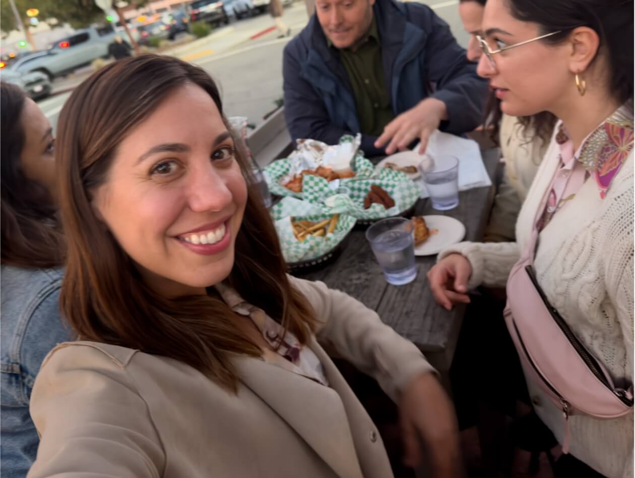 Woman who is taking MYFEMBREE® (relugolix, estradiol, and norethindrone acetate) for her endometriosis pain feels relief and takes a selfie. Not an actual patient.